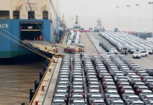 Geely cars for export enter a cargo vessel at Ningbo Zhoushan port in Zhejiang province