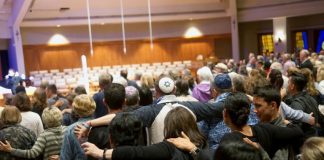 Rabbi wounded in US synagogue shooting says Jews won't be cowed