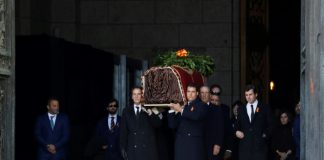After exhumation, Spain reburies Franco in discreet tomb