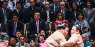 Sumo wrestlers meet match in larger-than-life Trump